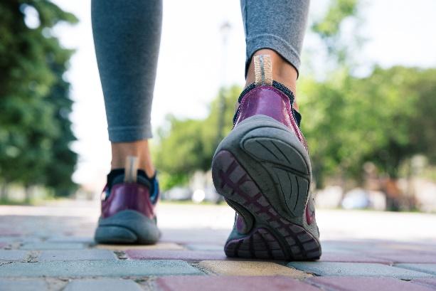 Woman walking in athletic footwear