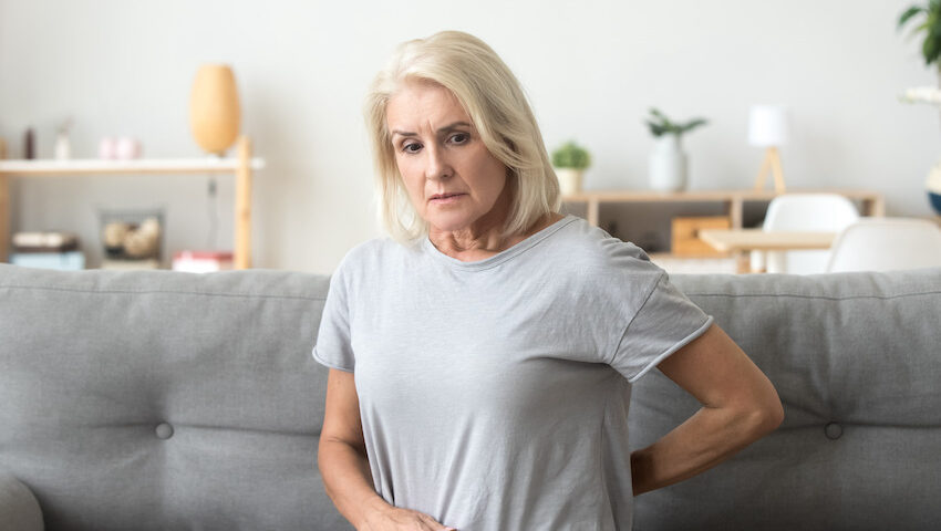 Senior woman with lumbar pain